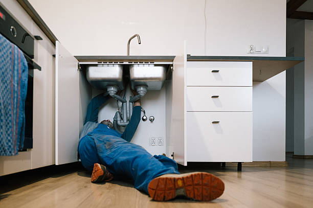 Professional Plumbing technician working in Redlands, CA